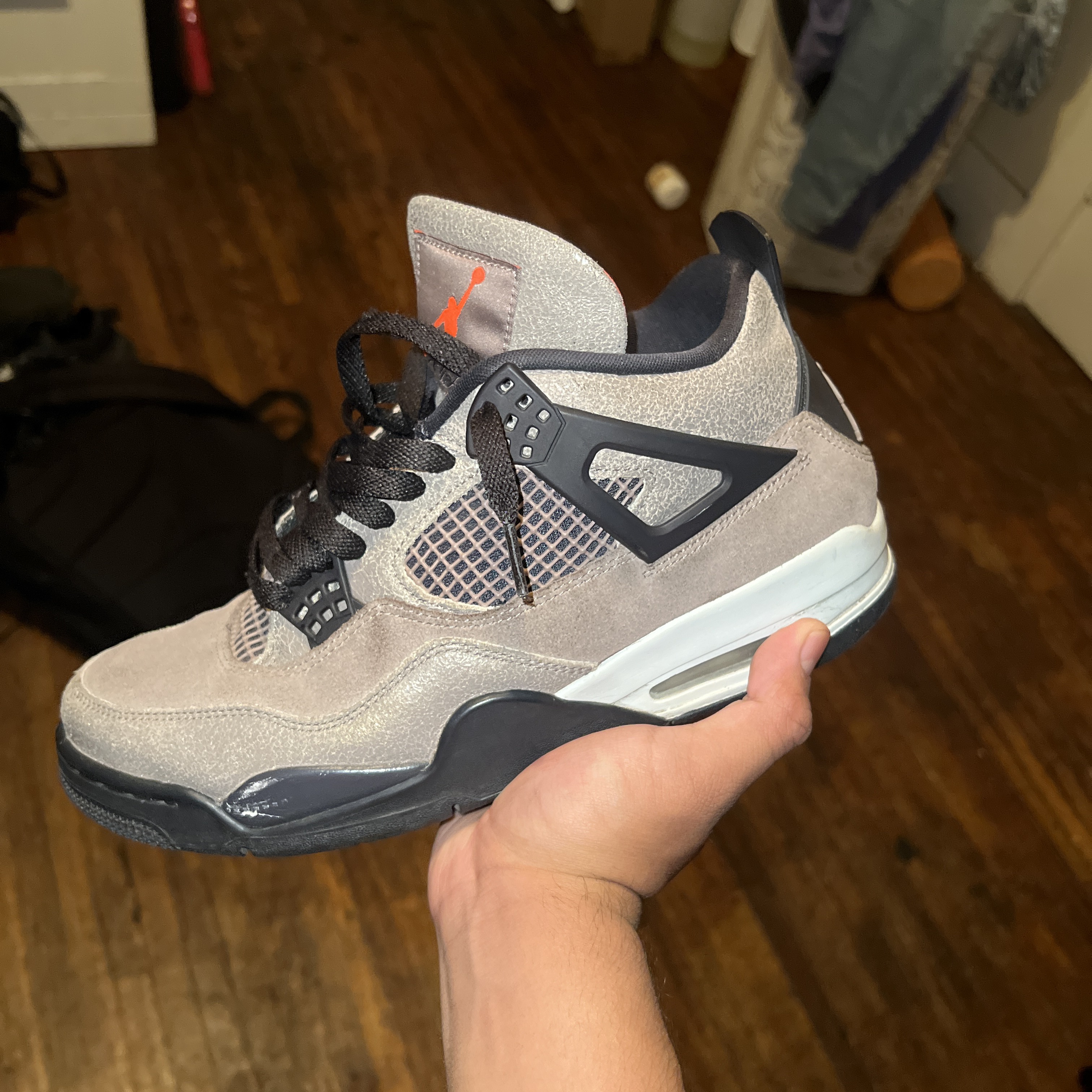 jordan 4 taupe haze fake vs real